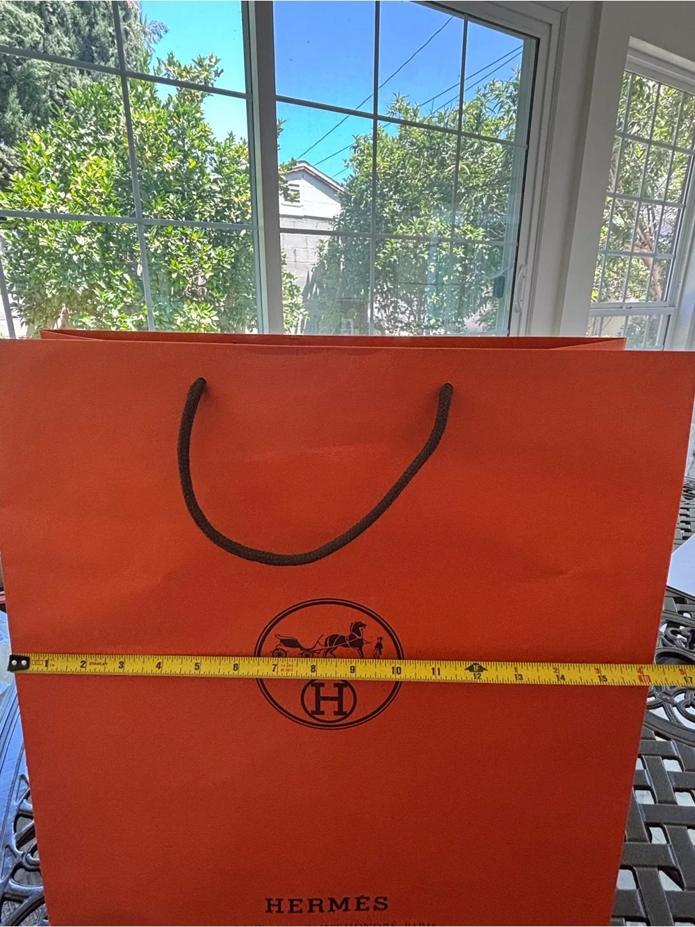Hermes Orange Shopping Bag with Black Rope Handles